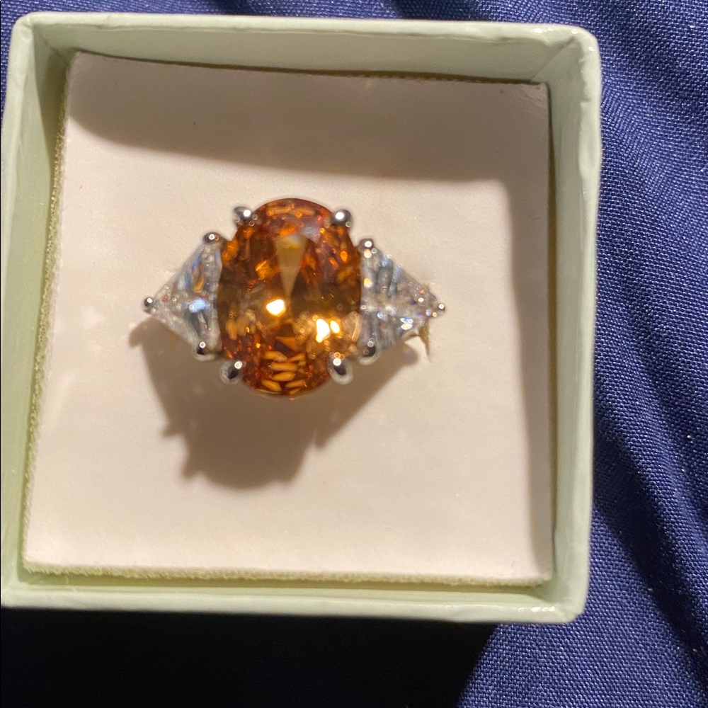 Ross-Simons Sterling Silver and Champagne CZ ring wit side trillions.